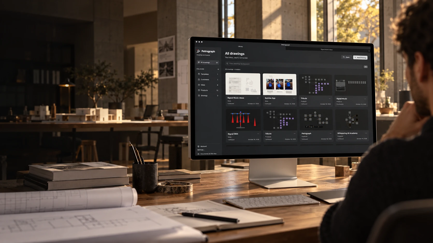 Petrograph on a large Mac display in a sunlit architecture studio
